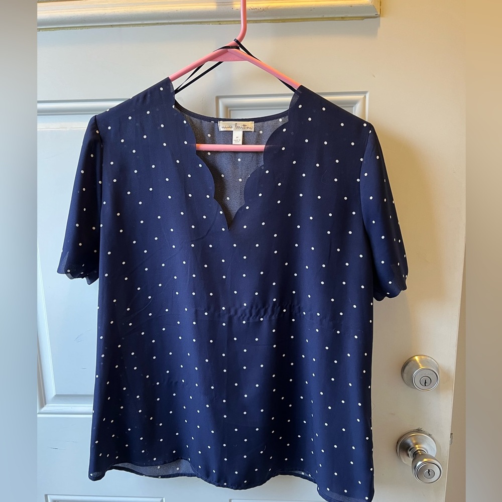 Navy blue and white polka dot top